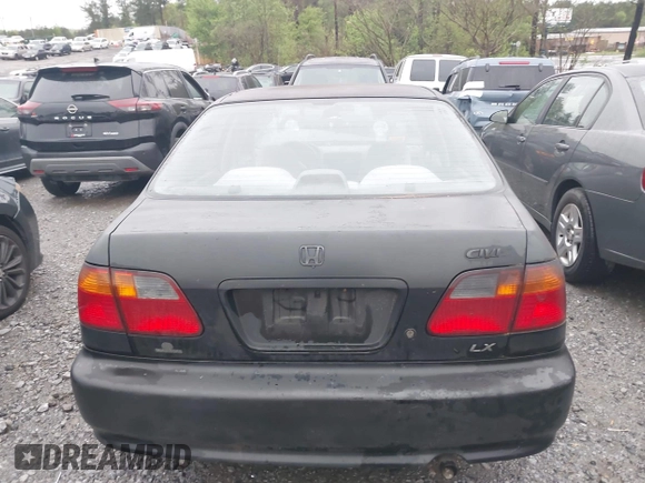 2000 Honda Civic LX with VIN 1HGEJ6674YL005143, listed as a IAAI auction lot 41961215 with 252,818 mi miles. Bid and sale history available at carsss.com. Image 16.
