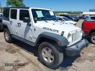 2015 Jeep Wrangler Unlimited Sport with VIN 1C4BJWDGXFL702432, listed as a IAAI auction lot 42293702 with 96,632 mi miles and . Bid and sale history available at DreamBid. Image 1.