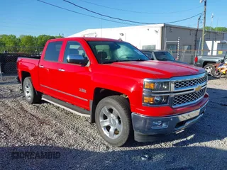 2014 Chevrolet Silverado 1500 LTZ with VIN 3GCUKSEC2EG300040, listed as a IAAI auction lot 42037164 with 64,271 mi miles. Bid and sale history available at carsss.com. Image 1.