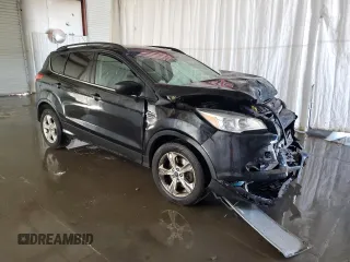 2015 Ford Escape SE with VIN 1FMCU9G99FUB64824, listed as a Copart auction lot 54930305 with 143,388 mi miles and Clean Title. Bid and sale history available at DreamBid. Image 4.