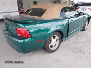 2001 Ford Mustang Deluxe z VIN 1FAFP44441F198354, wystawiony jako IAAI lot #42433701 z przebiegiem 69 328 mil mil oraz . Historia ofert i sprzedaży dostępna na DreamBid. Obrazek 4.