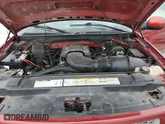 1999 Ford F-150 with VIN 1FTRF18W2XKB85753, listed as a Copart auction lot 55666595 with 78,888 mi miles and Salvage title. Bid and sale history available at DreamBid. Image 11.