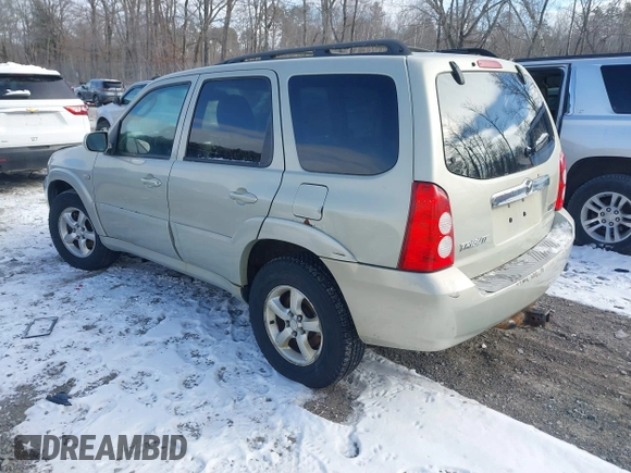 2006 Mazda Tribute LX with VIN 4F2YZ94126KM09467, listed as a IAAI auction lot 41324941 with 116,519 mi miles and . Bid and sale history available at DreamBid. Image 3.