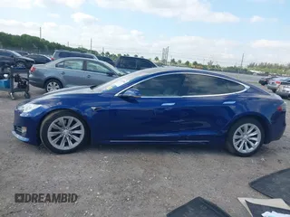 2017 Tesla Model S 100D with VIN 5YJSA1E28HF217489, listed as a IAAI auction lot 42128388 with Not provided miles and . Bid and sale history available at DreamBid. Image 15.