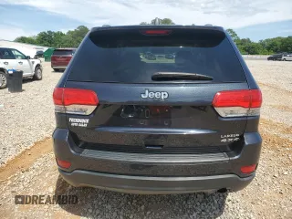2014 Jeep Grand Cherokee Laredo with VIN 1C4RJEAGXEC160132, listed as a Copart auction lot 55599615 with 127,541 mi miles and Clean Title. Bid and sale history available at DreamBid. Image 6.
