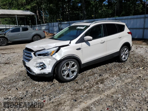 2019 Ford Escape Titanium with VIN 1FMCU9J97KUA21390, listed as a Copart auction lot 57640175 with 51,254 mi miles and Salvage title. Bid and sale history available at DreamBid. Image 1.
