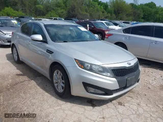 2012 Kia Optima LX with VIN 5XXGM4A77CG074198, listed as a IAAI auction lot 41927738 with 163,697 mi miles. Bid and sale history available at carsss.com. Image 1.