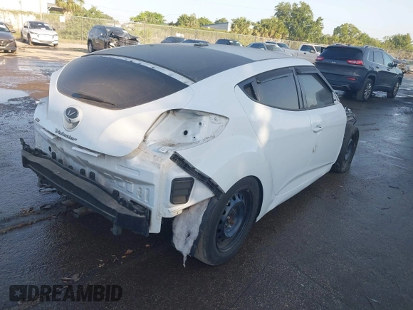2017 Hyundai Veloster with VIN KMHTC6AD2HU312538, listed as a IAAI auction lot 42128452 with 1 mi miles. Bid and sale history available at carsss.com. Image 4.
