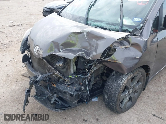 2015 Toyota Sienna SE with VIN 5TDXK3DC8FS652966, listed as a IAAI auction lot 41576611 with 108,858 mi miles and . Bid and sale history available at DreamBid. Image 6.