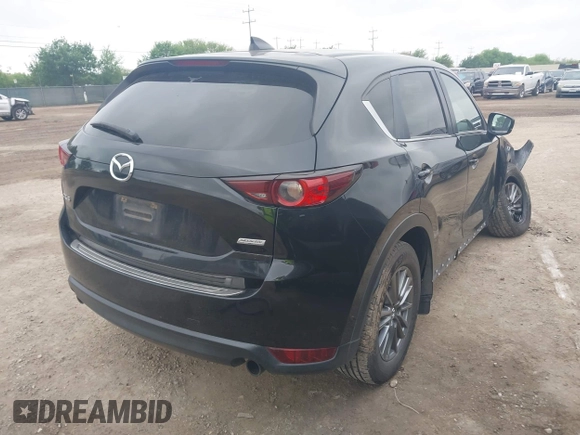 2017 Mazda CX-5 Touring with VIN JM3KFACL1H0222889, listed as a IAAI auction lot 41913789 with 153,321 mi miles. Bid and sale history available at carsss.com. Image 4.