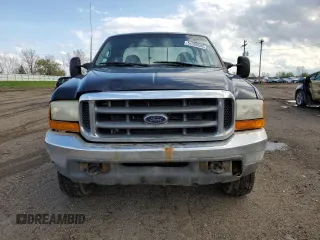 2000 Ford F-350 XL with VIN 1FTSX31S2YEE37213, listed as a Copart auction lot 54300595 with 141,273 mi miles and Clean title. Bid and sale history available at DreamBid. Image 5.