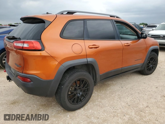 2015 Jeep Cherokee Trailhawk with VIN 1C4PJMBSXFW757382, listed as a Copart auction lot 53566885 with 139,972 mi miles and Clean Title. Bid and sale history available at carsss.com. Image 3.