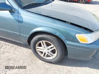 2001 Toyota Camry CE with VIN 4T1BG28K91U852861, listed as a IAAI auction lot 41912480 with 217,404 mi miles. Bid and sale history available at carsss.com. Image 6.