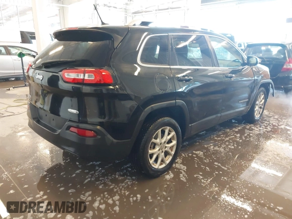 2015 Jeep Cherokee Latitude with VIN 1C4PJLCB9FW536767, listed as a IAAI auction lot 41380122 with 192,535 mi miles. Bid and sale history available at carsss.com. Image 4.
