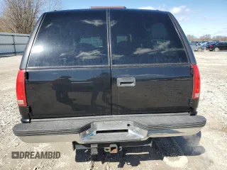1999 GMC Suburban z VIN 3GKGK26J2XG514835, wystawiony jako Copart lot #47853685 z przebiegiem 124 657 mil mil oraz Tytuł czysty. Historia ofert i sprzedaży dostępna na DreamBid. Obrazek 6.