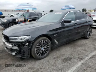2023 BMW 5 Series 530e with VIN WBA13AG01PCM24624, listed as a Copart auction lot 55149855 with 26,022 mi miles and Salvage title. Bid and sale history available at DreamBid. Image 1.