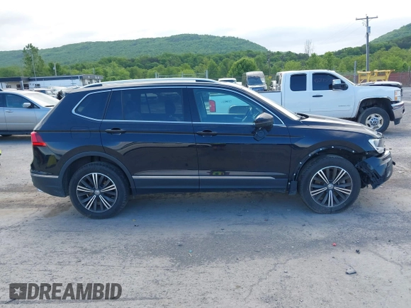 2018 Volkswagen Tiguan SEL z VIN 3VV2B7AXXJM145781, wystawiony jako IAAI lot #42273176 z przebiegiem 86 610 mil mil oraz . Historia ofert i sprzedaży dostępna na DreamBid. Obrazek 14.