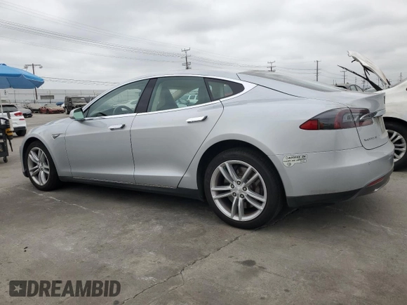 2014 Tesla Model S 60 with VIN 5YJSA1H14EFP34335, listed as a Copart auction lot 65504325 with Not provided miles and Clean title. Bid and sale history available at DreamBid. Image 2.