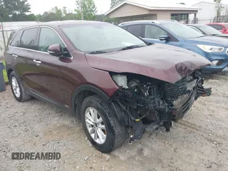 2019 Kia Sorento LX z VIN 5XYPGDA53KG482701, wystawiony jako IAAI lot #42229929 z przebiegiem 161 526 mil mil oraz . Historia ofert i sprzedaży dostępna na DreamBid. Obrazek 1.