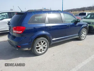 2017 Dodge Journey SXT z VIN 3C4PDDBG6HT697189, wystawiony jako IAAI lot #41717359 z przebiegiem 128 073 mil mil oraz . Historia ofert i sprzedaży dostępna na DreamBid. Obrazek 4.