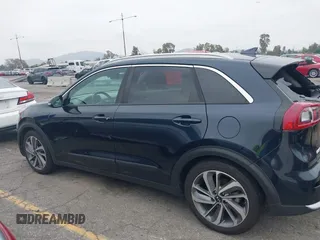 2017 Kia Niro Touring with VIN KNDCE3LC6H5048381, listed as a IAAI auction lot 42035129 with 133,559 mi miles. Bid and sale history available at carsss.com. Image 14.