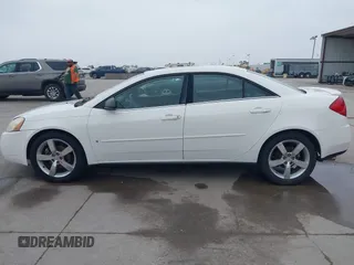 2006 Pontiac G6 GTP z VIN 1G2ZM551X64224909, wystawiony jako IAAI lot #42289564 z przebiegiem 193 418 mil mil oraz . Historia ofert i sprzedaży dostępna na DreamBid. Obrazek 14.