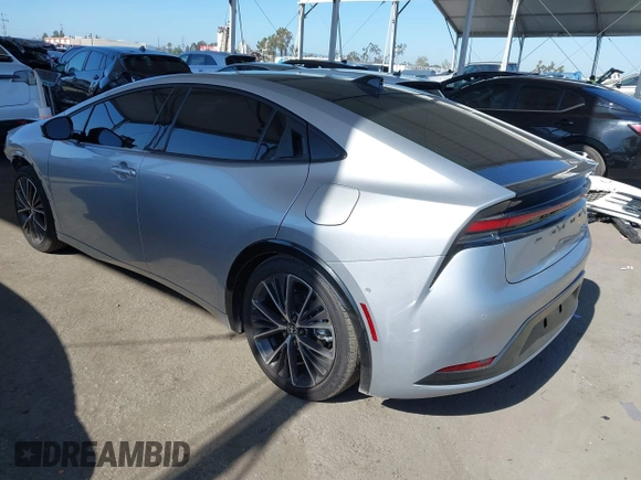 2024 Toyota Prius LE z VIN JTDACAAU0R3034244, wystawiony jako IAAI lot #42312682 z przebiegiem 4 102 mil mil oraz . Historia ofert i sprzedaży dostępna na DreamBid. Obrazek 3.