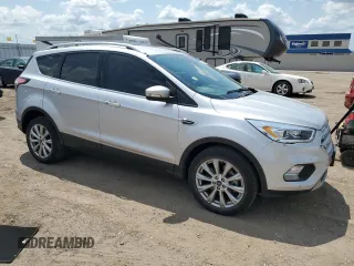 2018 Ford Escape Titanium with VIN 1FMCU9J99JUC89677, listed as a Copart auction lot 60421545 with 98,021 mi miles and Salvage title. Bid and sale history available at DreamBid. Image 4.