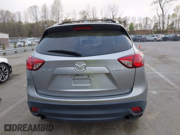 2013 Mazda CX-5 Touring with VIN JM3KE2CE0D0105115, listed as a IAAI auction lot 41899956 with 301,264 mi miles. Bid and sale history available at carsss.com. Image 16.