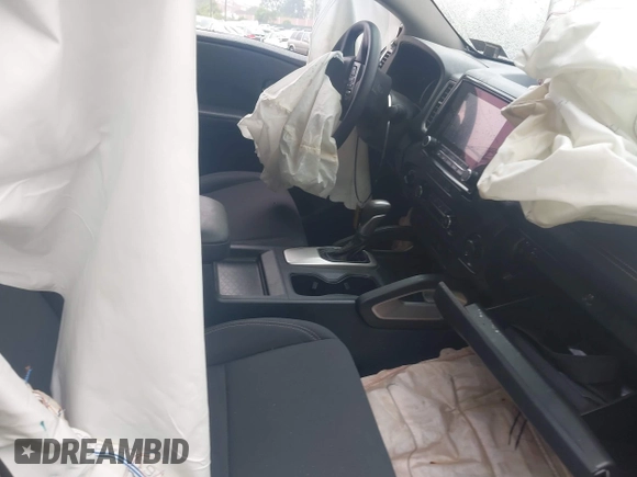 2023 Nissan Frontier SV with VIN 1N6ED1EK5PN656523, listed as a IAAI auction lot 42341035 with 38,653 mi miles and . Bid and sale history available at DreamBid. Image 5.