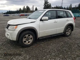 2008 Suzuki Grand Vitara w/Spare & Cargo Covers z VIN JS3TD941084101778, wystawiony jako Copart lot #86121544 z przebiegiem 125 802 mil mil oraz Szkody całkowita. Historia ofert i sprzedaży dostępna na DreamBid. Obrazek 1.