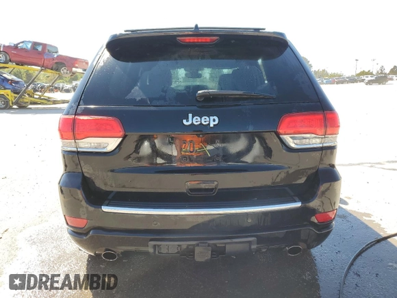 2017 Jeep Grand Cherokee Overland with VIN 1C4RJFCTXHC778491, listed as a Copart auction lot 73944594 with 99,235 mi miles and Clean Title. Bid and sale history available at carsss.com. Image 6.