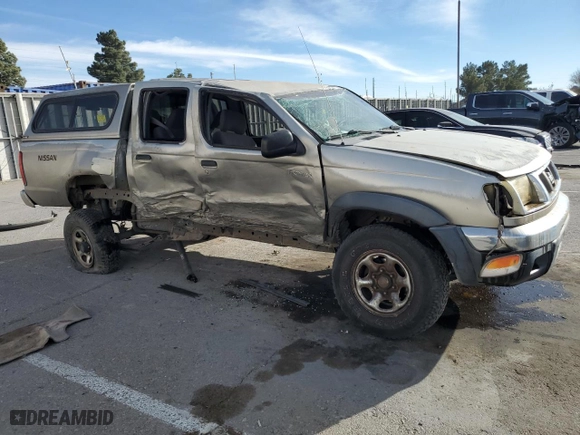 2000 Nissan Frontier 2WD XE with VIN 1N6ED27T9YC333035, listed as a Copart auction lot 87266324 with 189,898 mi miles and Salvage Title. Bid and sale history available at carsss.com. Image 4.