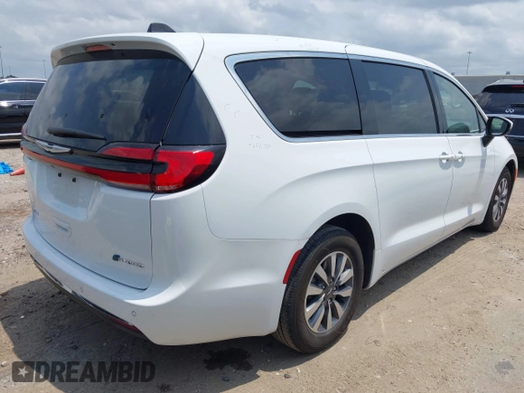 2023 Chrysler Pacifica Hybrid Touring L z VIN 2C4RC1L76PR618422, wystawiony jako IAAI lot #42289283 z przebiegiem 40 744 mil mil oraz . Historia ofert i sprzedaży dostępna na DreamBid. Obrazek 4.