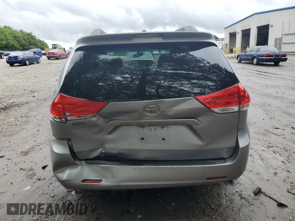 2012 Toyota Sienna LE AAS with VIN 5TDKK3DC8CS224112, listed as a Copart auction lot 59701725 with 200,726 mi miles and Salvage title. Bid and sale history available at DreamBid. Image 6.
