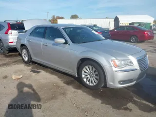 2012 Chrysler 300 with VIN 2C3CCAAG6CH104745, listed as a IAAI auction lot 40708856 with 125,186 mi miles. Bid and sale history available at carsss.com. Image 1.