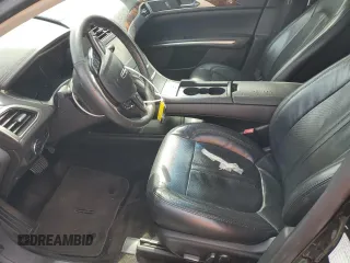 2014 Lincoln MKZ z VIN 3LN6L2GK3ER828065, wystawiony jako Copart lot #56925665 z przebiegiem 187 050 mil mil oraz Szkoda całkowita • Salvage title. Historia ofert i sprzedaży dostępna na DreamBid. Obrazek 7.
