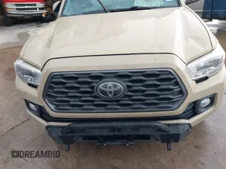 2020 Toyota Tacoma SR5 with VIN 5TFCZ5AN7LX231676, listed as a IAAI auction lot 42596728 with 101,362 mi miles and . Bid and sale history available at DreamBid. Image 12.