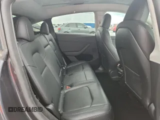2024 Tesla Model Y Long Range with VIN 7SAYGDEE9RA255688, listed as a Copart auction lot 58918665 with 21,302 mi miles and Salvage title. Bid and sale history available at DreamBid. Image 11.