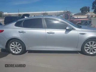 2018 Kia Optima LX with VIN 5XXGT4L31JG267716, listed as a IAAI auction lot 41890611 with 63,491 mi miles and . Bid and sale history available at carsss.com. Image 13.