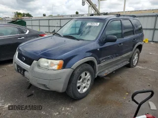 2002 Ford Escape XLT Choice with VIN 1FMYU04192KD87001, listed as a Copart auction lot 57860475 with 195,323 mi miles and Salvage title. Bid and sale history available at DreamBid. Image 1.