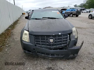 2012 Cadillac CTS z VIN 1G6DA5E54C0104773, wystawiony jako Copart lot #51142135 z przebiegiem Nie podano mil oraz Czysty tytuł • Clean title. Historia ofert i sprzedaży dostępna na DreamBid. Obrazek 5.