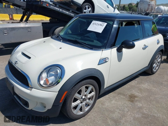 2011 MINI Hardtop S with VIN WMWSV3C50BTY23450, listed as a IAAI auction lot 42121502 with 239,025 mi miles and . Bid and sale history available at DreamBid. Image 2.