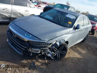 2021 Honda Accord Touring with VIN 1HGCV3F91MA002413, listed as a IAAI auction lot 40682887 with 101,653 mi miles and . Bid and sale history available at DreamBid. Image 2.