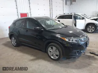 2020 Honda HR-V EX with VIN 3CZRU6H59LM737305, listed as a IAAI auction lot 41679197 with 76,670 mi miles. Bid and sale history available at carsss.com. Image 1.