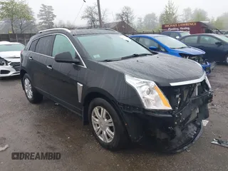 2014 Cadillac SRX Luxury Collection z VIN 3GYFNEE32ES643679, wystawiony jako IAAI lot #42172274 z przebiegiem 122 276 mil mil oraz . Historia ofert i sprzedaży dostępna na DreamBid. Obrazek 14.