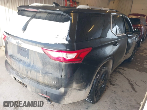 2018 Chevrolet Traverse LT Leather with VIN 1GNEVHKW5JJ215903, listed as a IAAI auction lot 41351125 with 136,739 mi miles. Bid and sale history available at carsss.com. Image 4.