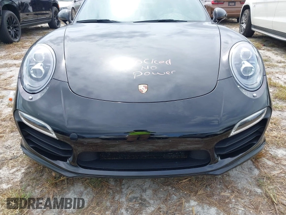 2014 Porsche 911 Turbo S with VIN WP0AD2A99ES167048, listed as a IAAI auction lot 40643041 with Not Provided miles. Bid and sale history available at carsss.com. Image 6.