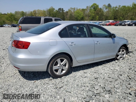 2012 Volkswagen Jetta TDI w/Premium & Nav с VIN 3VWLL7AJ4CM426910, выставлен на аукционе Copart как лот 53111065 с пробегом 137 376 миль миль и Списание • Salvage title. История ставок и продаж доступна на DreamBid. Изображение 3.