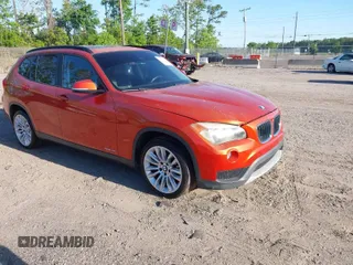 2013 BMW X1 28i with VIN WBAVM1C58DVW45105, listed as a IAAI auction lot 42049919 with 141,020 mi miles. Bid and sale history available at carsss.com. Image 1.
